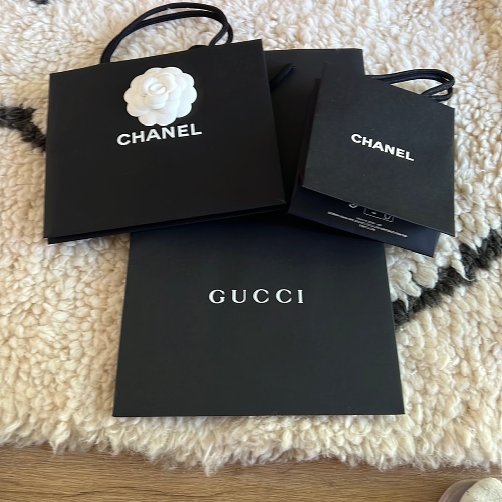 Chanel shopping bag and Gucci shopping bag